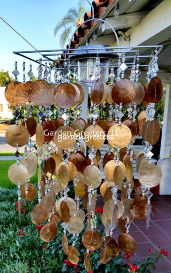 picture of SOLAR CAPIZ SHELL WINDCHIMES/CHANDELIER AMBER/GOLD CAPIZ CHIMES- - Click Image to Close