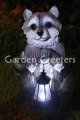 picture of RACOON WITH SOLAR LIGHT Solar Statue Raccoon Figurine